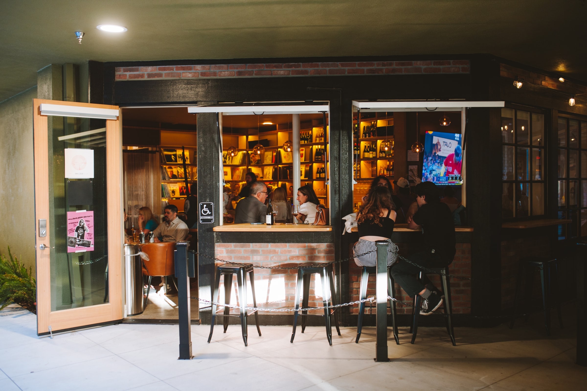 Analogue Room bar and vinyl lounge storefront in Solvang at night